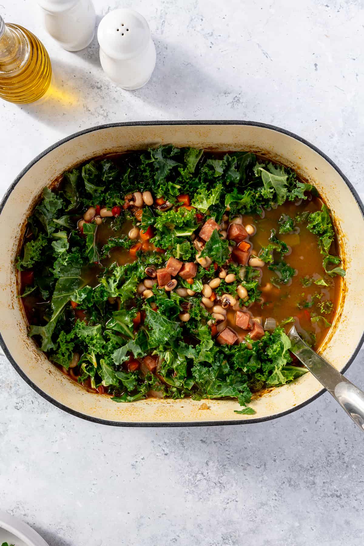 Kale in dutch oven with soup base.