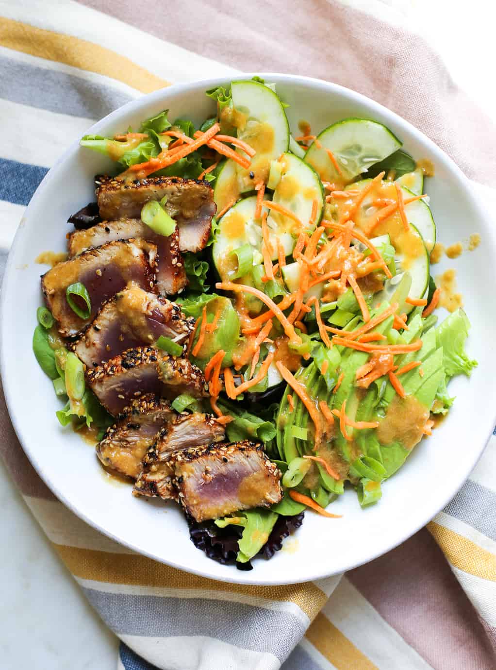 This Seared Tuna Salad with Pineapple-Sesame Dressing is so darn simple yet...
