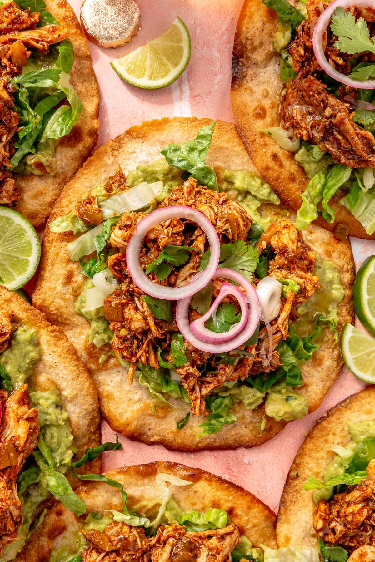 Close up of Easy Rotisserie Chicken Tostadas with Quick Pickled Onions. 