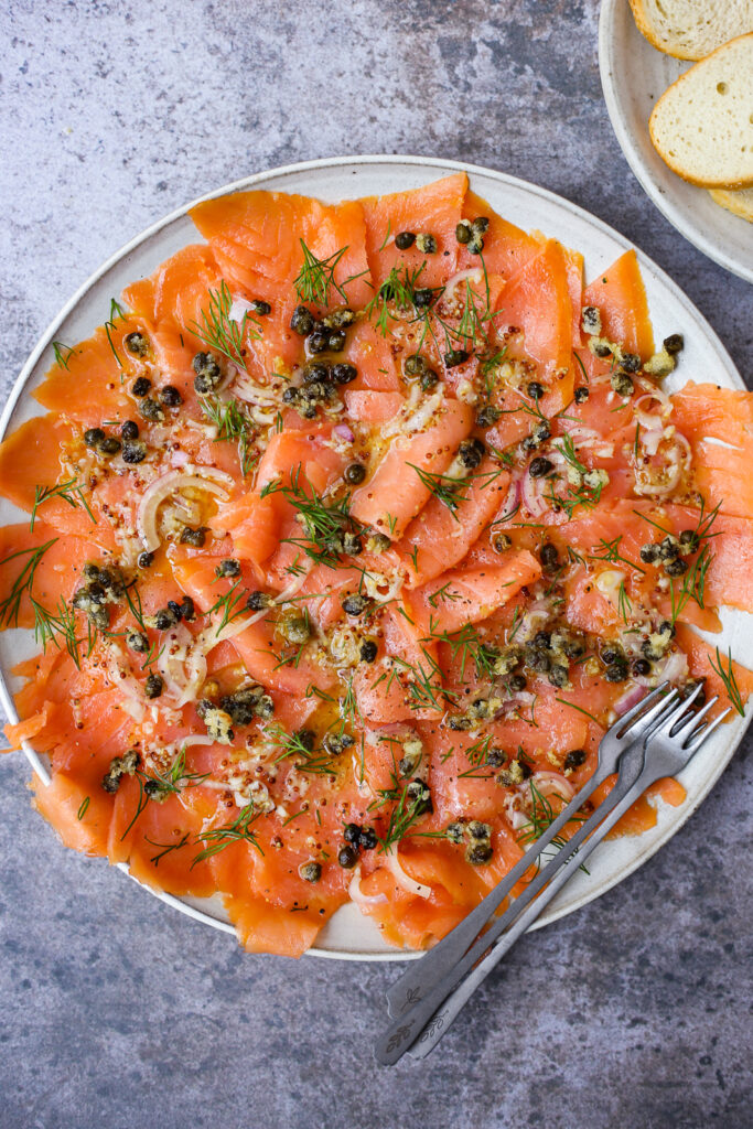 smoked salmon carpaccio with fried capers and herbs