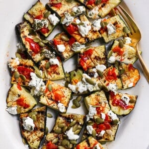 Grilled Zucchini with Calabrian Chiles, Goat Cheese, and Pepitas
