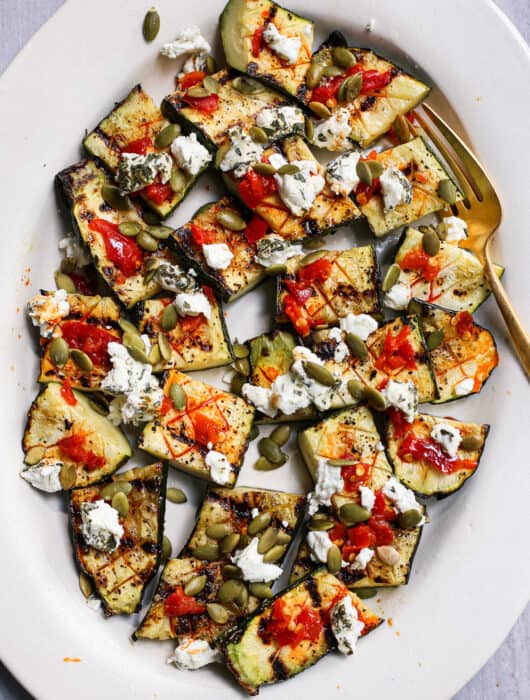 Grilled Zucchini with Calabrian Chiles, Goat Cheese, and Pepitas