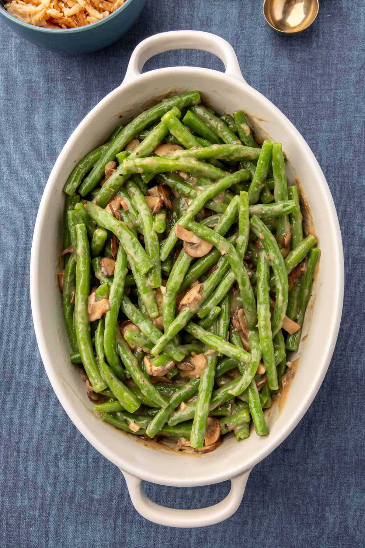Homemade Green Bean Casserole in oval baking dish without the crispy onions.