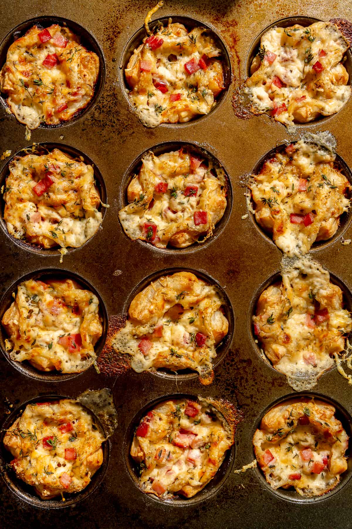 Baked Mini Croque Monsieur Bites in muffin tins.