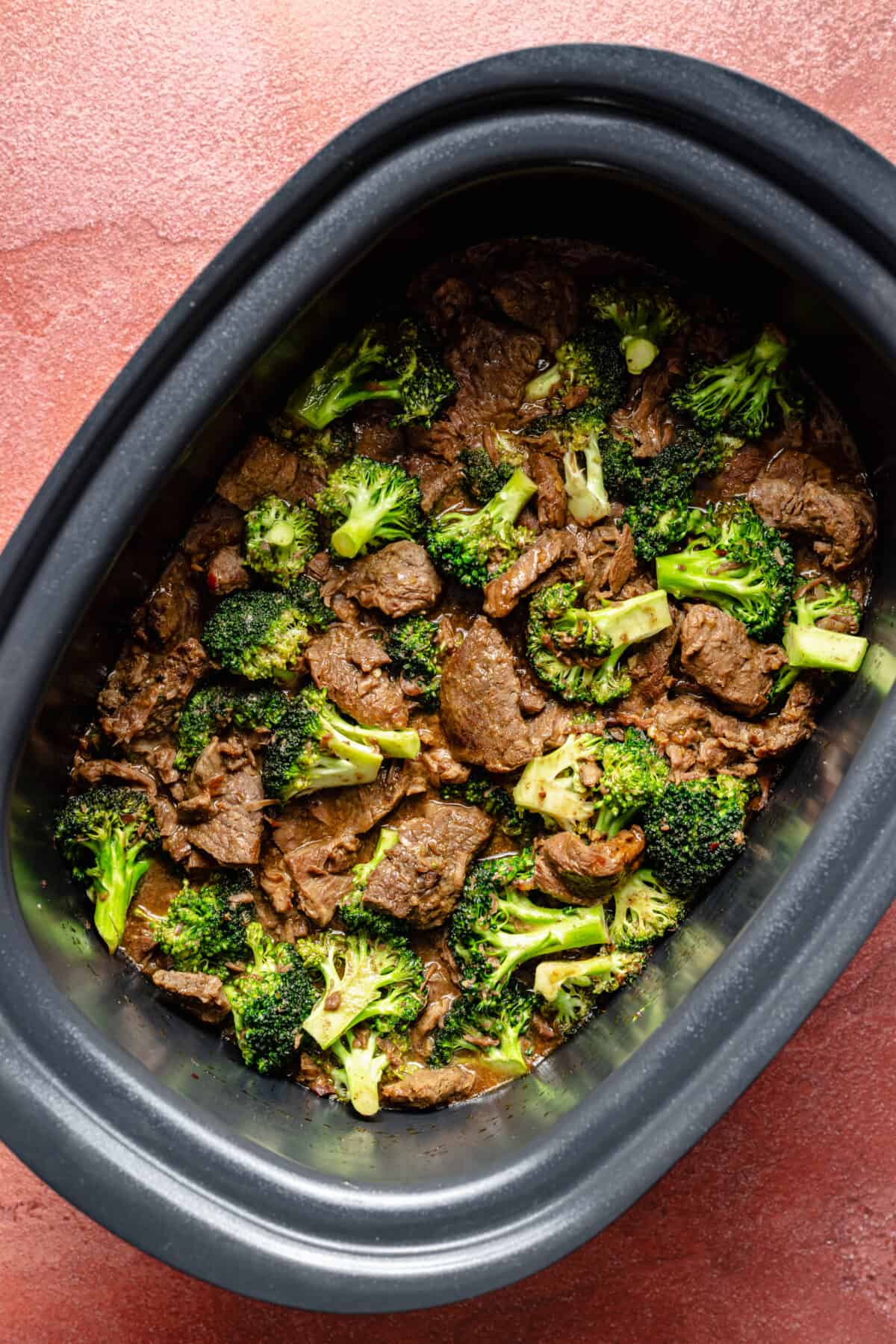 Cooked beef and broccoli in slow cooker.