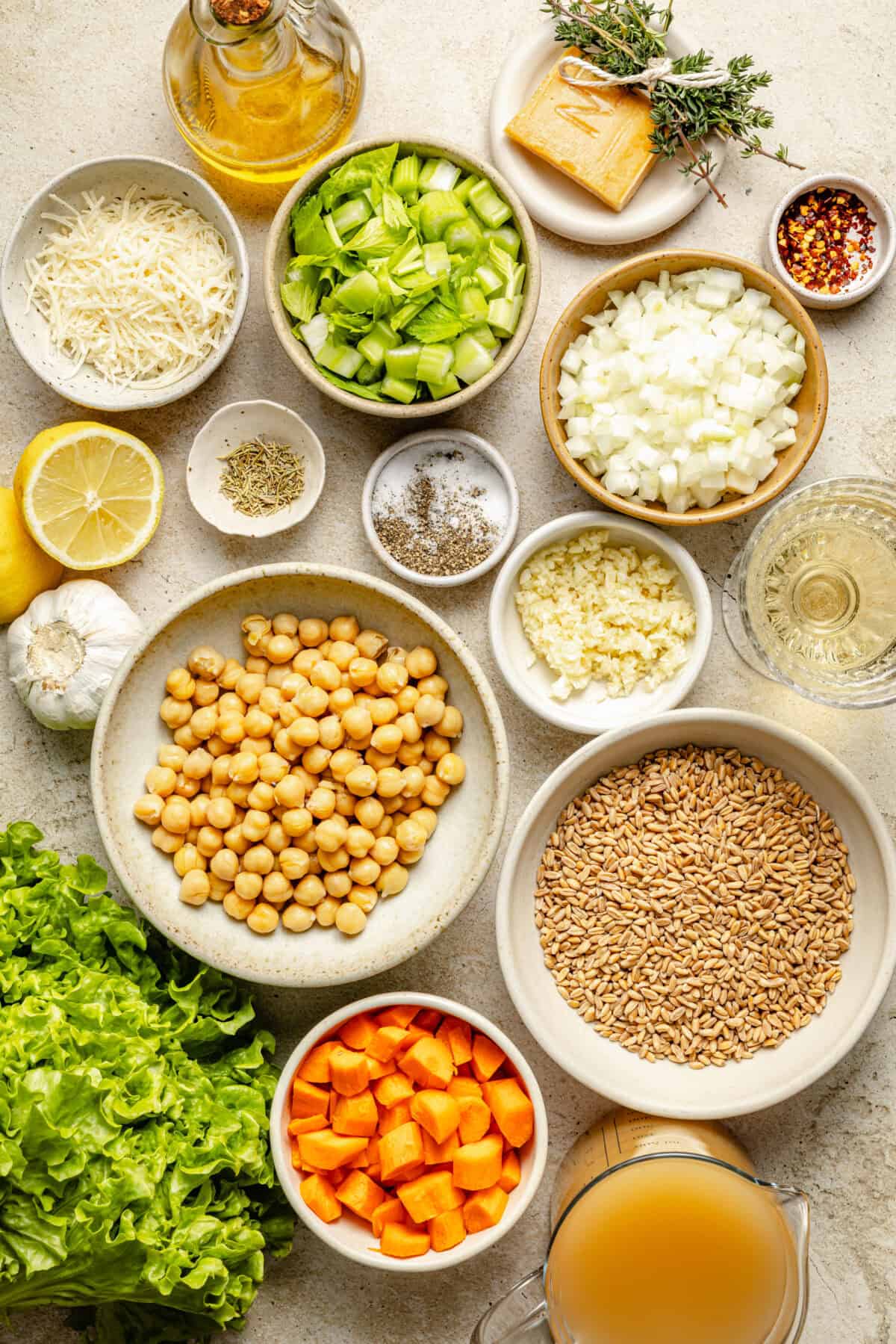 a flat lay of ingredients needed to make chickpea and farro soup