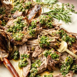 up-close shot of roasted leg of lamb with herb gremolata
