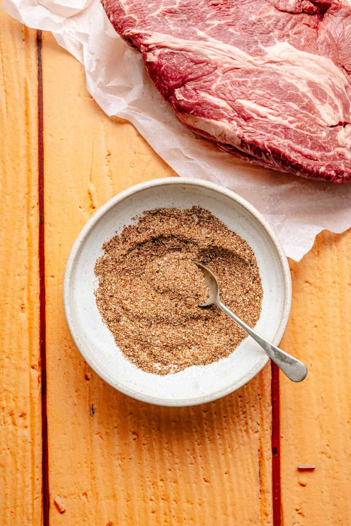 a bowl with dry spice mix for smoked chuck roast