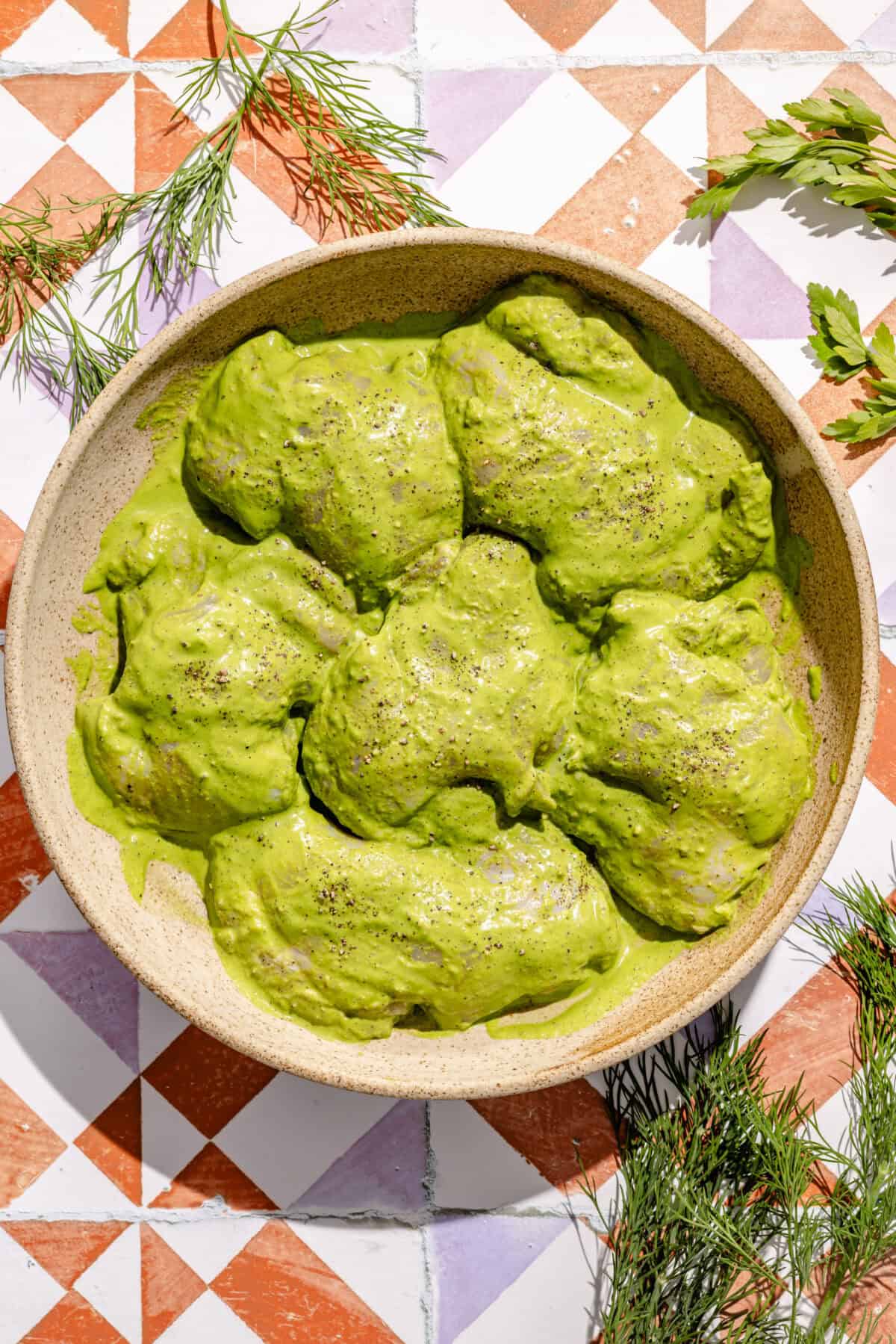 marinated chicken thighs in green goddess dressing