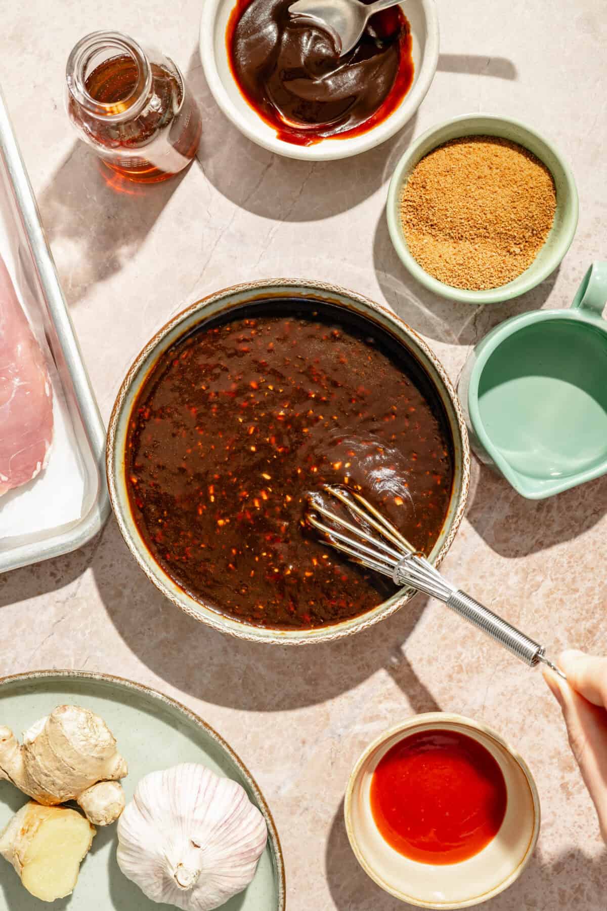 a bowl of marinade for pork tenderloin