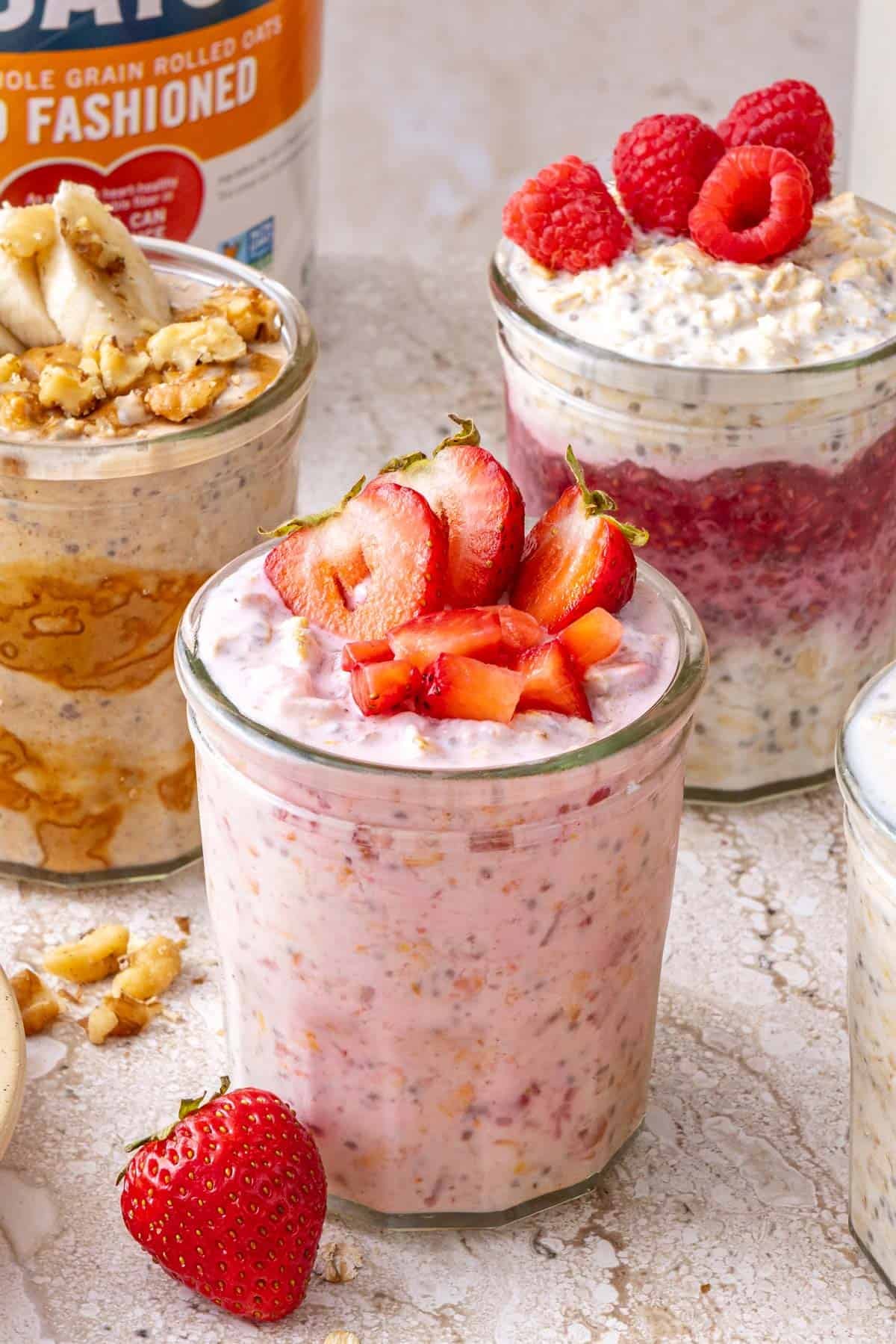Easy Overnight Oats (3 Ways) in jars with garnishes.