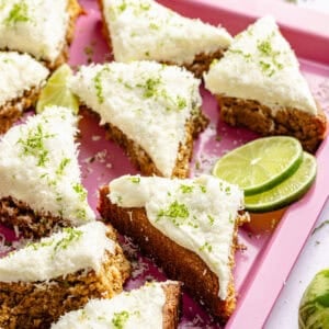 Copycat Starbucks Coconut Lime Bars on pink tray.