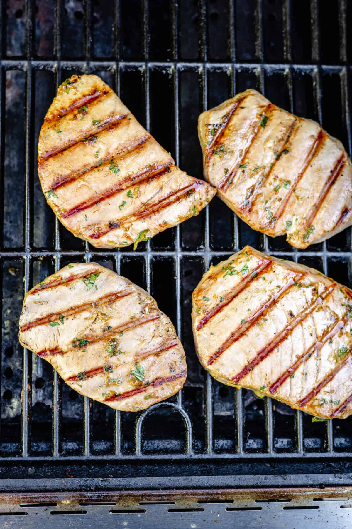 Grilled Ahi Tuna with Ponzu-Lime Marinadeย on grill