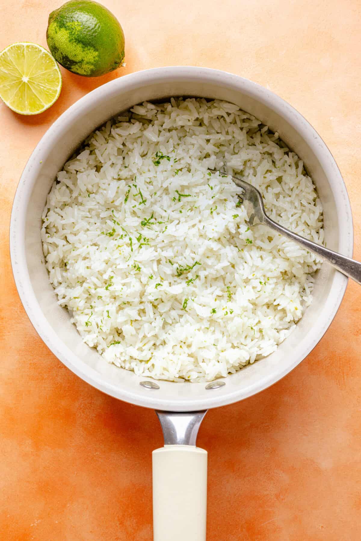 Cooked coconut lime rice in pot.