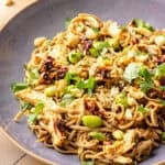 Peanut Chili Crunch Noodles in purple bowl.