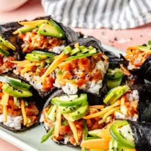 Spicy Tuna Hand rolls on a tray.