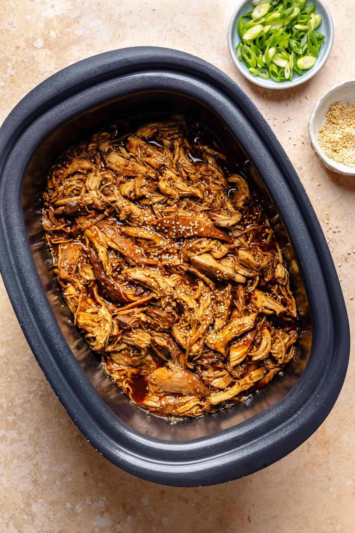 Slow Cooker Honey-Sesame Chicken cooked and in slow cooker.