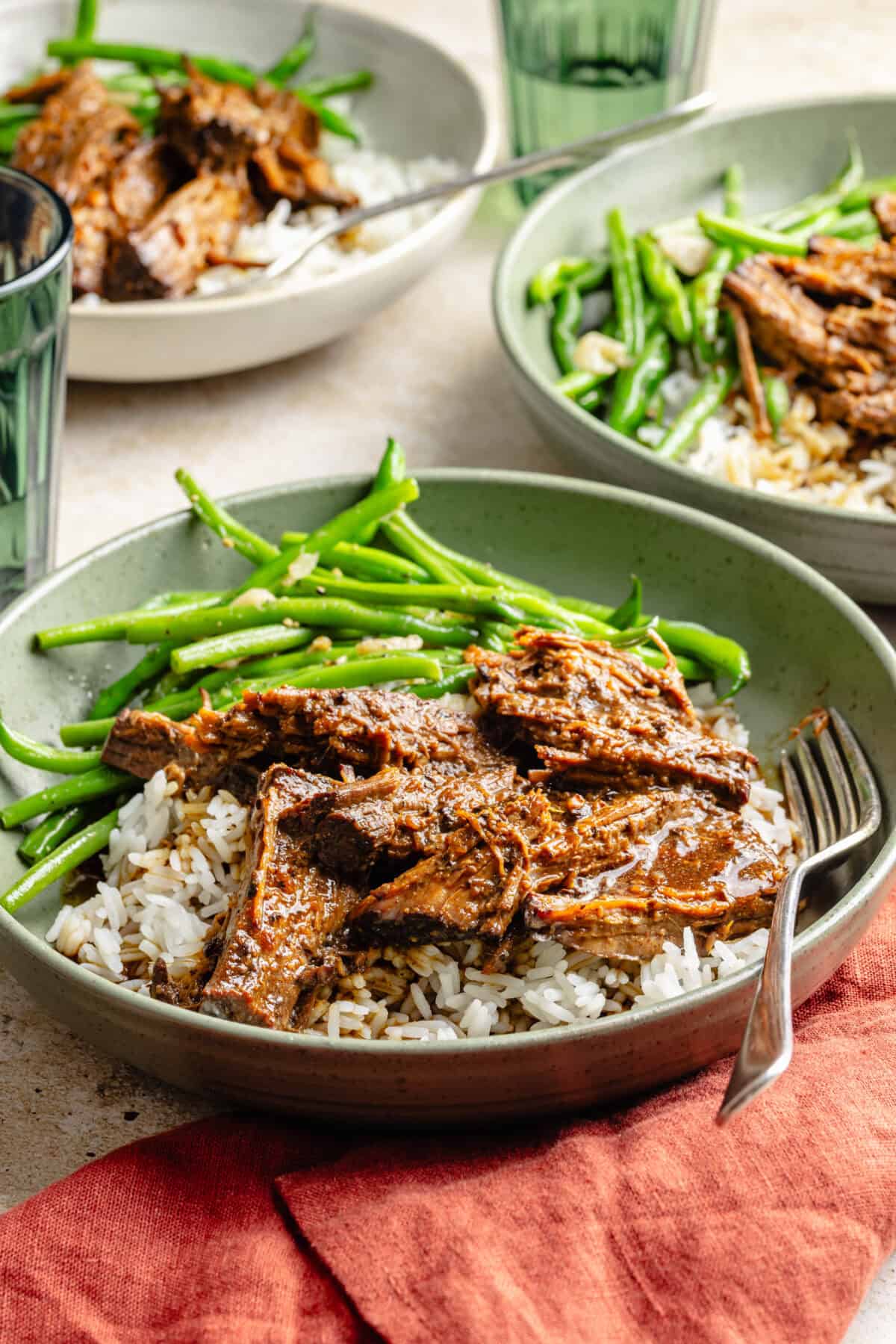 Slow Cooker Miso-Ginger Chuck Roast plated with rice and green beans.