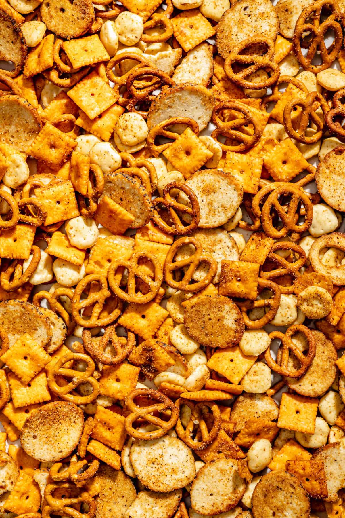Close up of Cajun Cheddar Snack Mix on sheet pan.