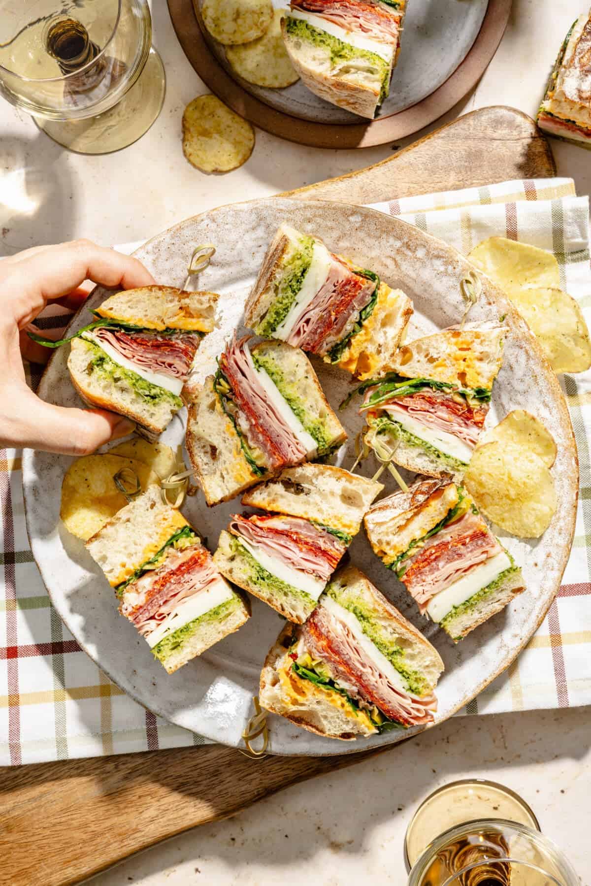 a platter with italian party sub sandwiches