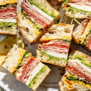 a platter with italian party sub sandwiches