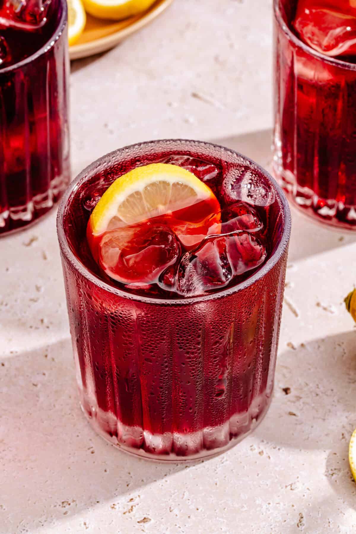 Tinto de Verano in a glass with lemon slice.